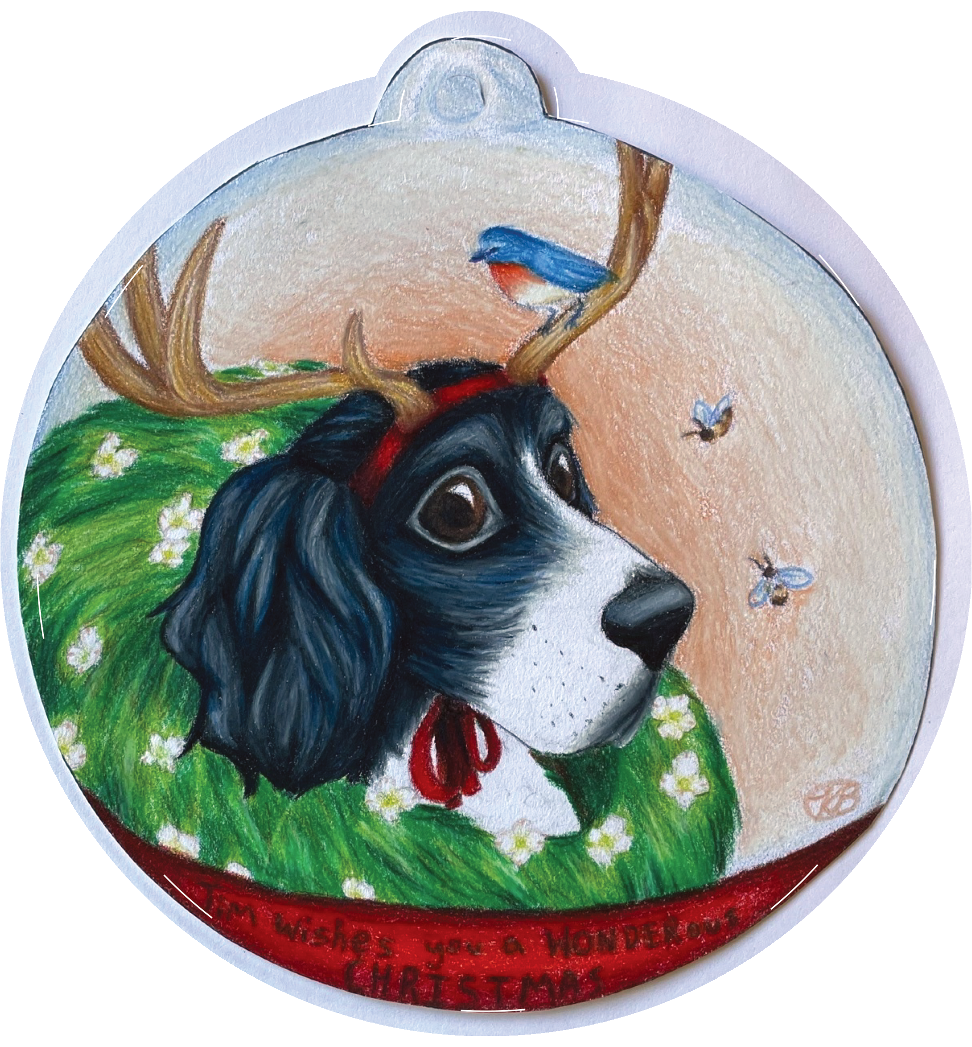 Ornament depicting a dog wearing antlers and a wreath around its neck