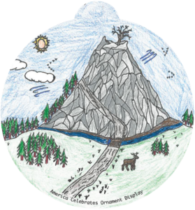 ornament depicting a trail leading up to a large stone mountain