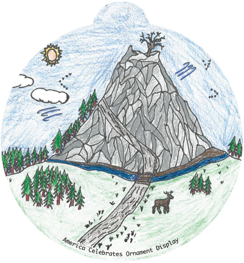 ornament depicting a trail leading up to a large stone mountain