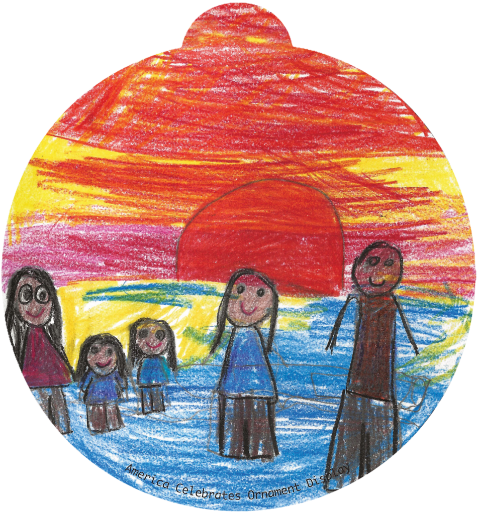 ornament depicting a family watching a sunset