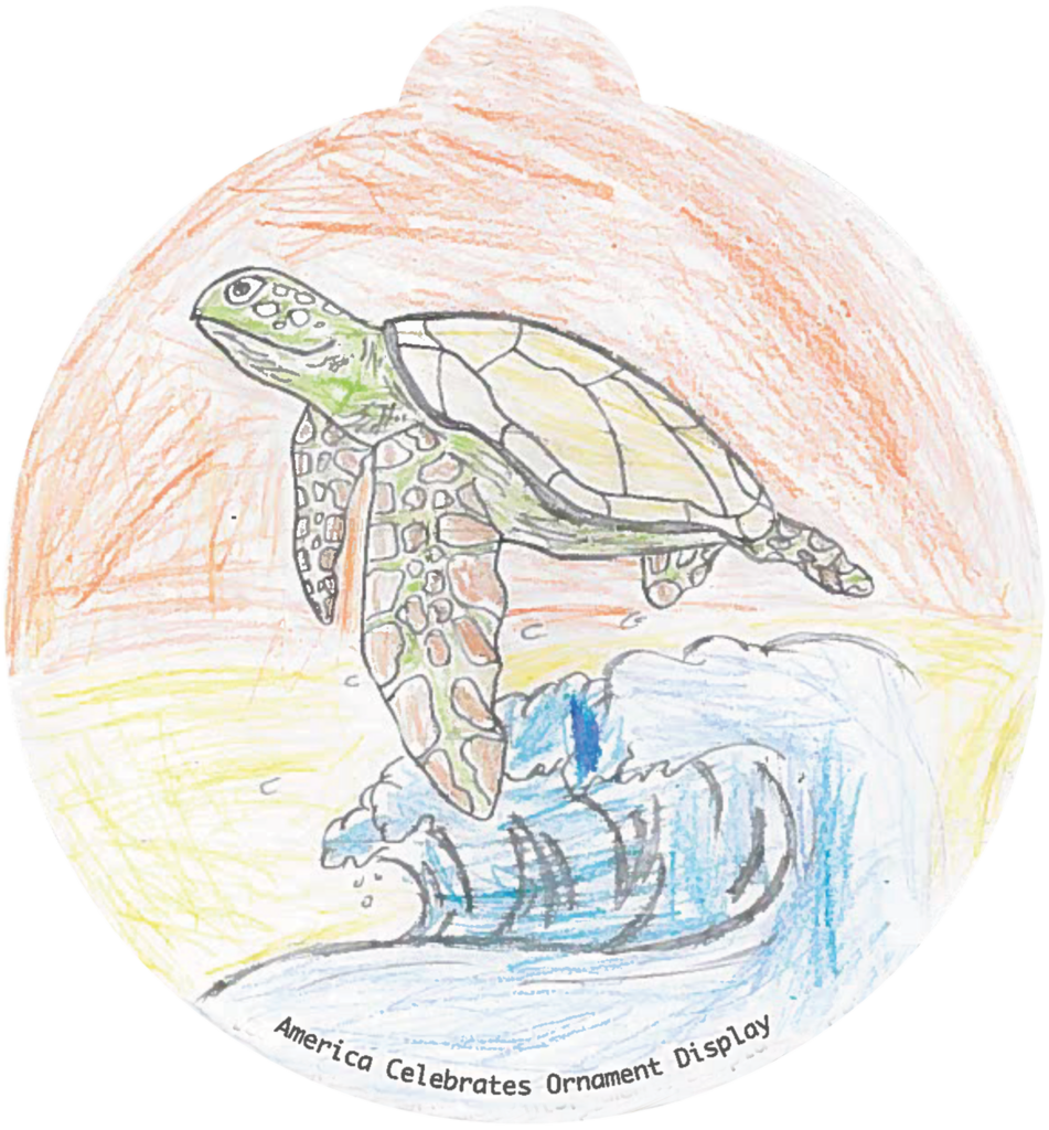 ornament depicting a sea turtle, a wave, and a sunset