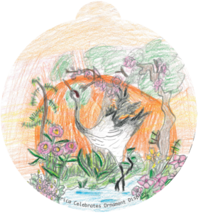 ornament depicting a crane against a sunset