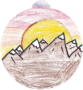 ornament depicting mountains against a sunrise