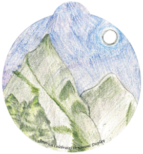 ornament depicting mountains in moonlight