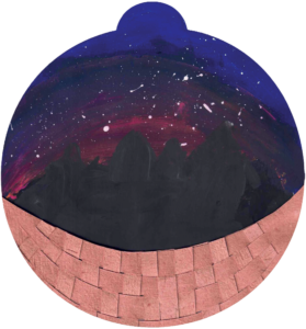 ornament depicting a night sky against mountaintops; at the bottom of the ornament is a woven basket