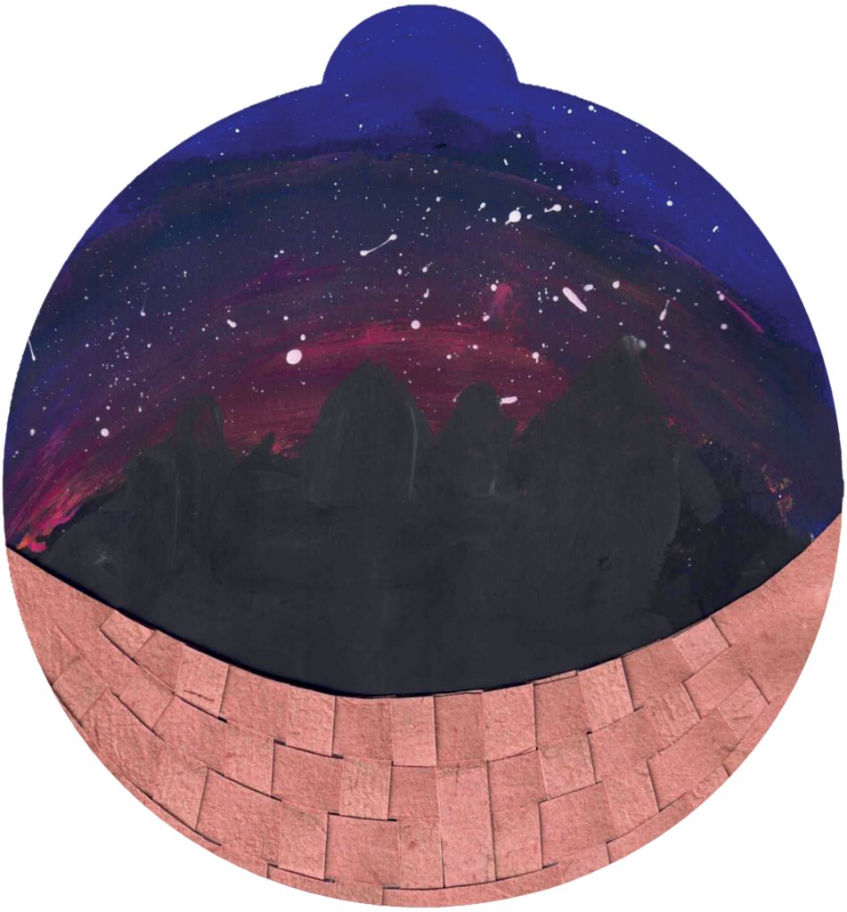 ornament depicting a night sky against mountaintops; at the bottom of the ornament is a woven basket