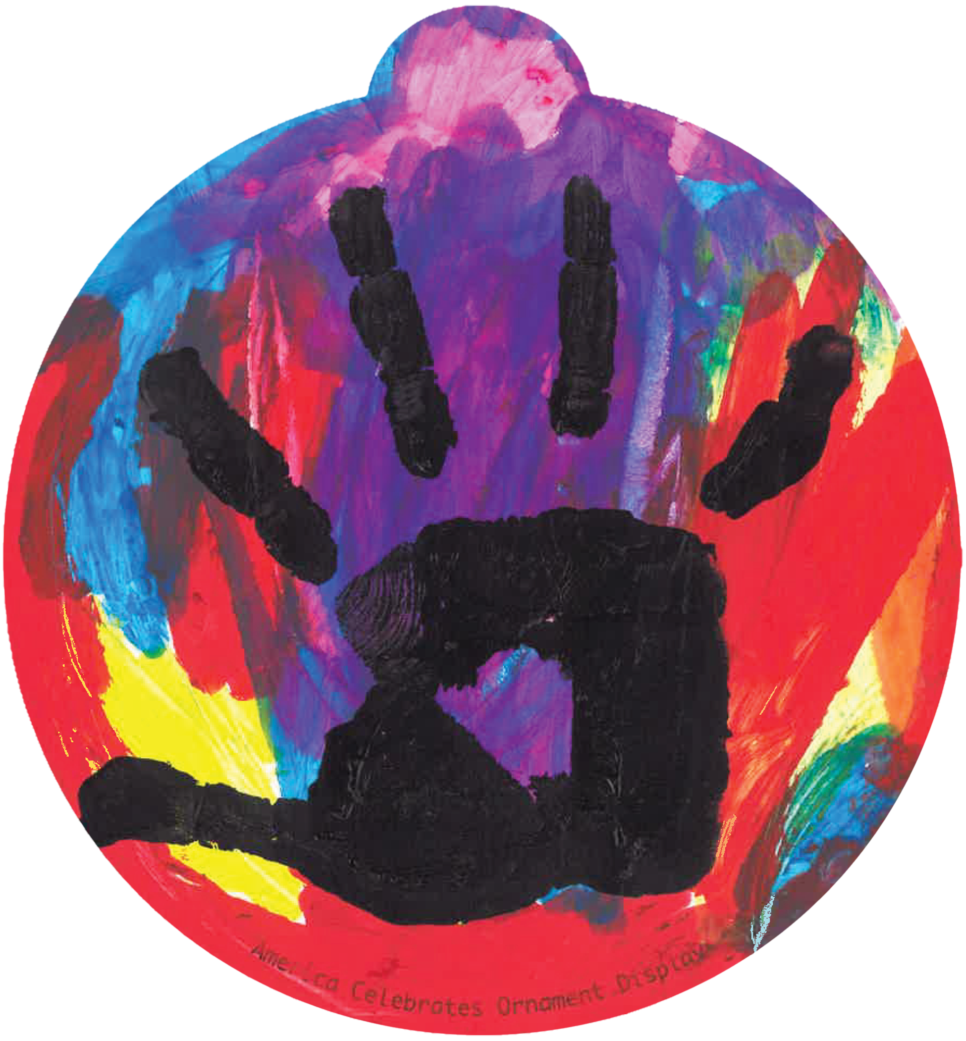 ornament with a collage of colors, on top a black handprint from a child