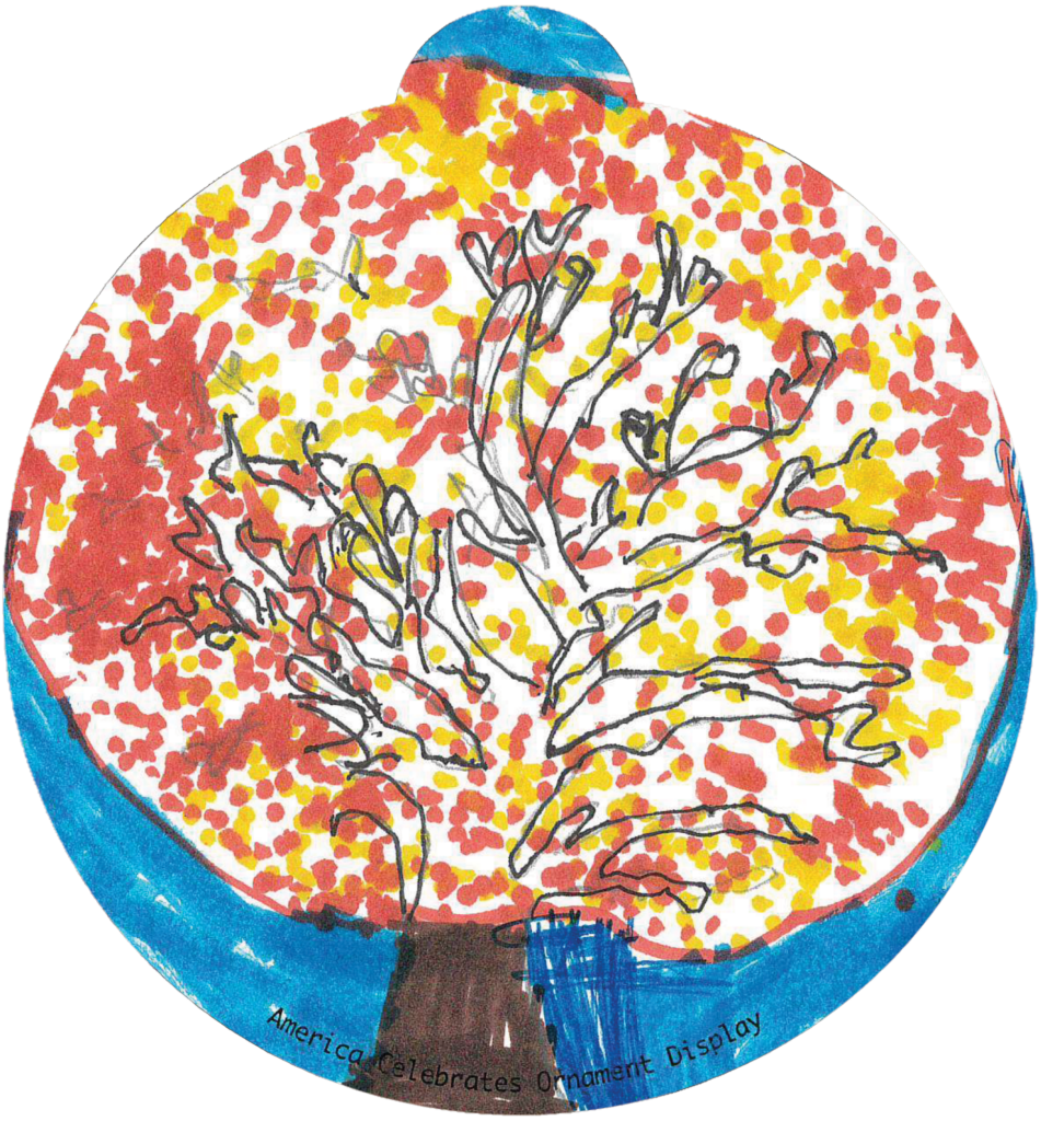 ornament depicting a tree with yellow and orange leaves